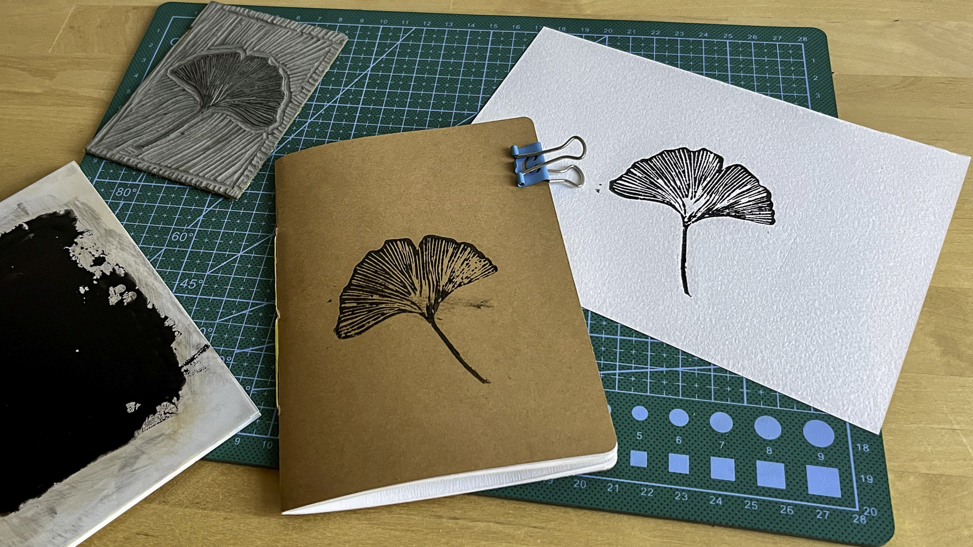 Fresh from the workbench Notebook and paper printed with lino block